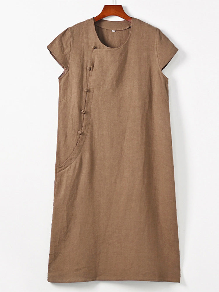 Vestido midi de manga corta confeccionado en 100% lino con botones