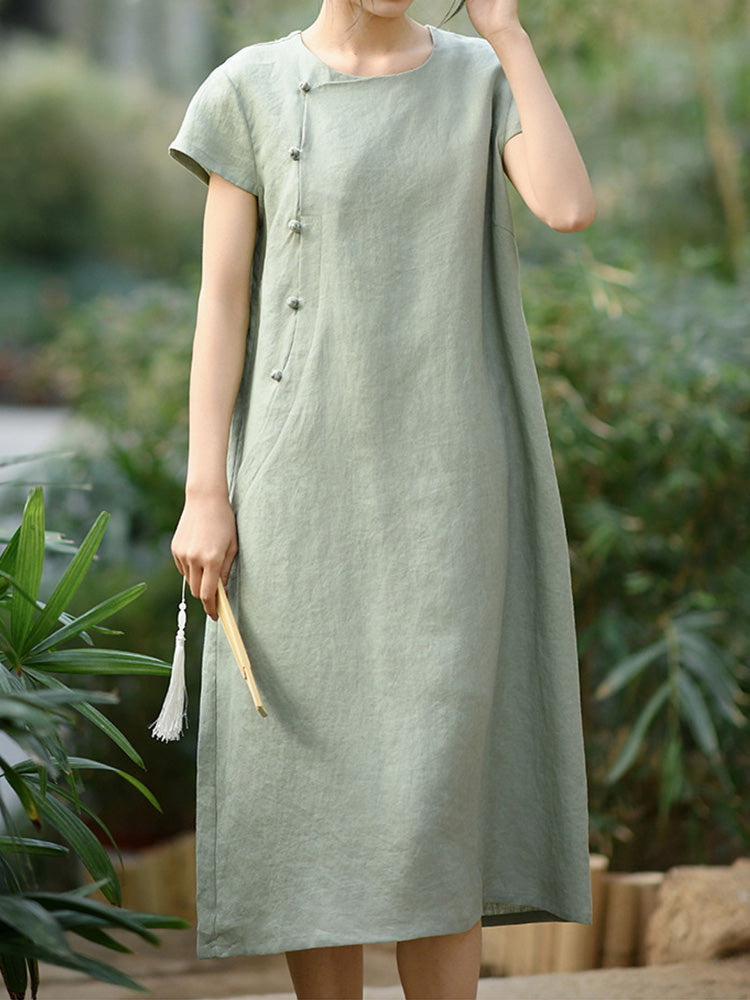 Vestido midi de manga corta confeccionado en 100% lino con botones
