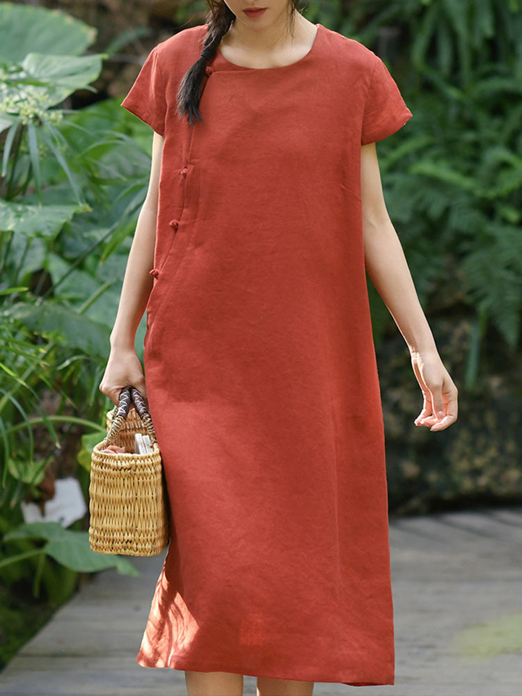 Vestido midi de manga corta confeccionado en 100% lino con botones