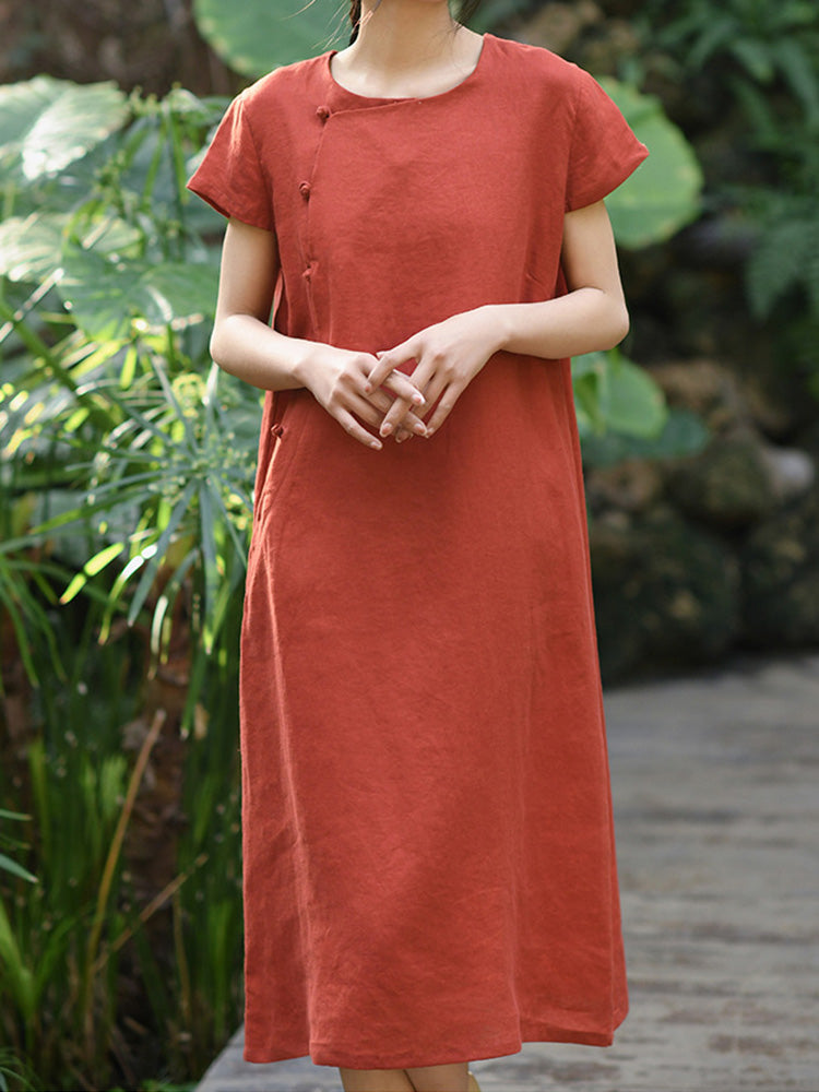 Vestido midi de manga corta confeccionado en 100% lino con botones