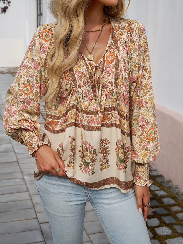 Blusa da donna con stampa floreale boho e nodo al collo