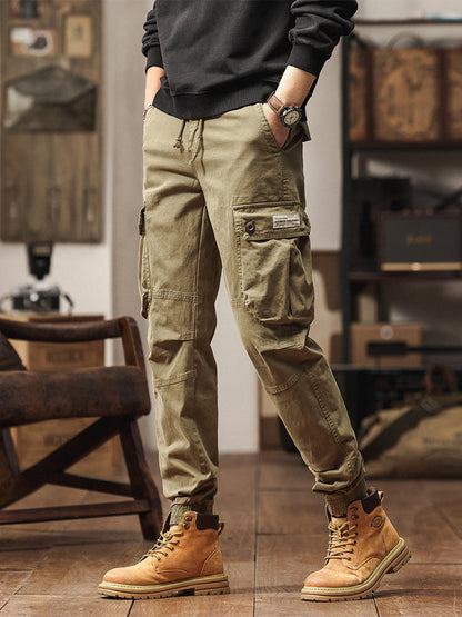 Pantaloni cargo jogger da uomo in stile vintage con tasche multiple e bottoni
