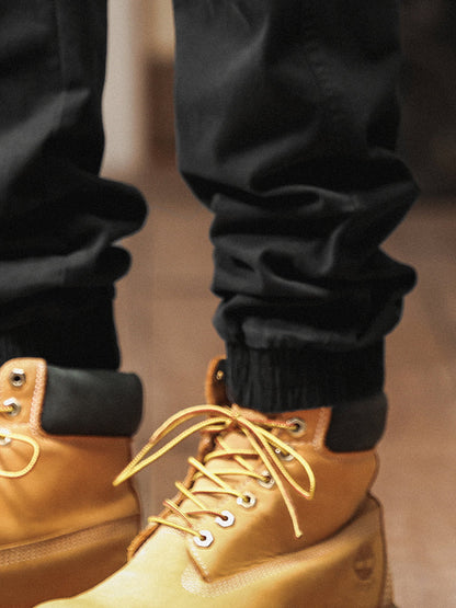 Pantaloni cargo jogger da uomo in stile vintage con tasche multiple e bottoni