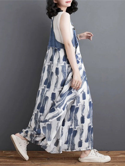 Abito salopette lungo in denim patchwork con stampa acquerello