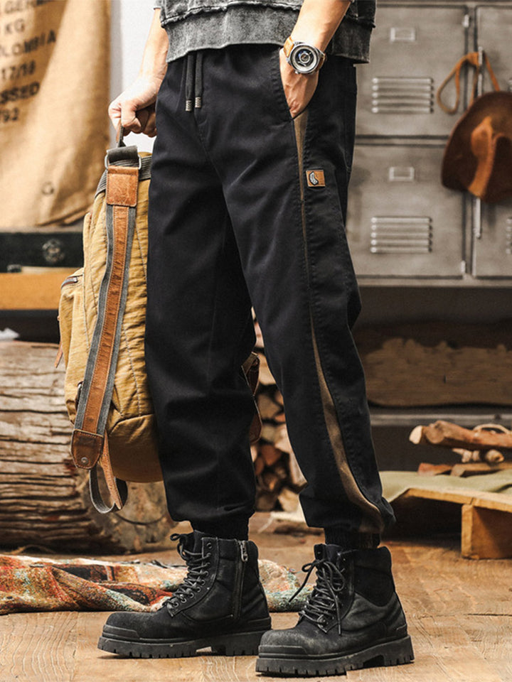 Pantalones de chándal para hombre con bandas laterales y acabado vintage