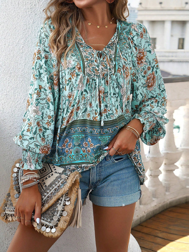 Blusa da donna con stampa floreale boho e nodo al collo