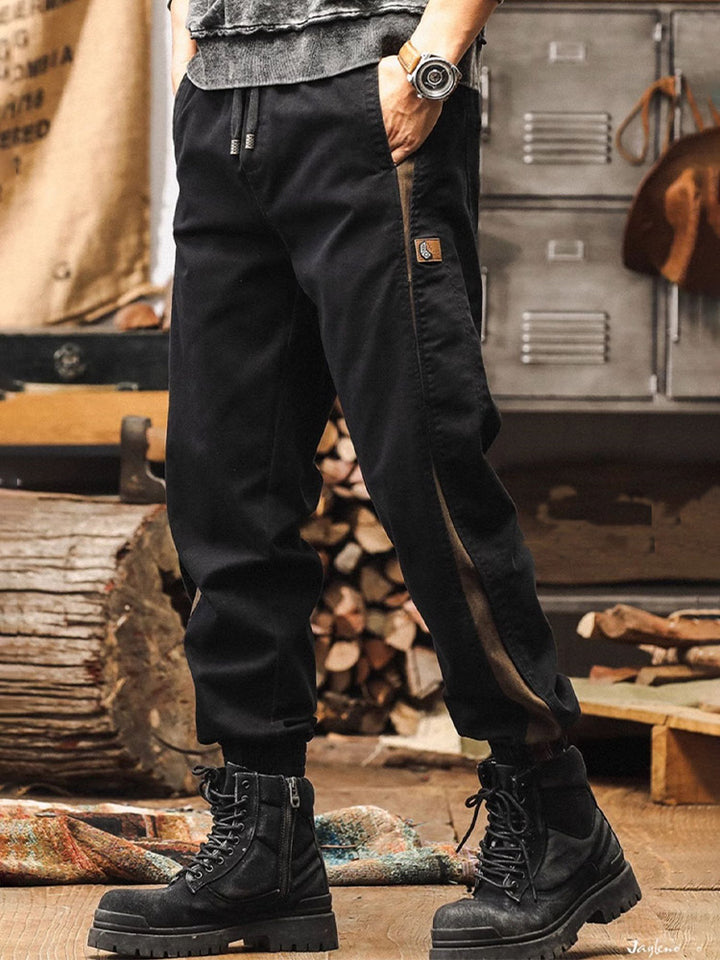 Pantalones de chándal para hombre con bandas laterales y acabado vintage