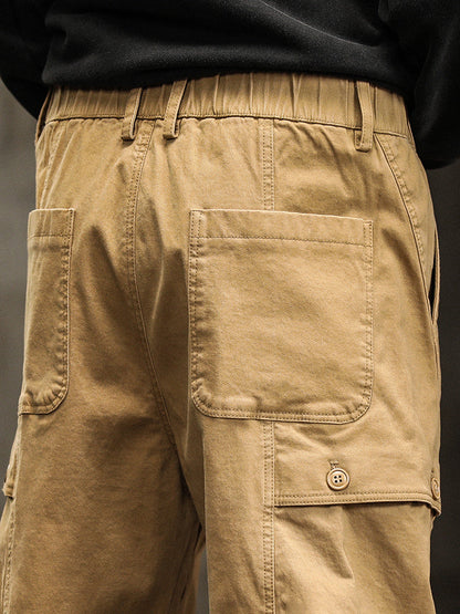 Herren-Cargohose mit elastischem Bund, Knopfleiste und schmal zulaufendem Bein