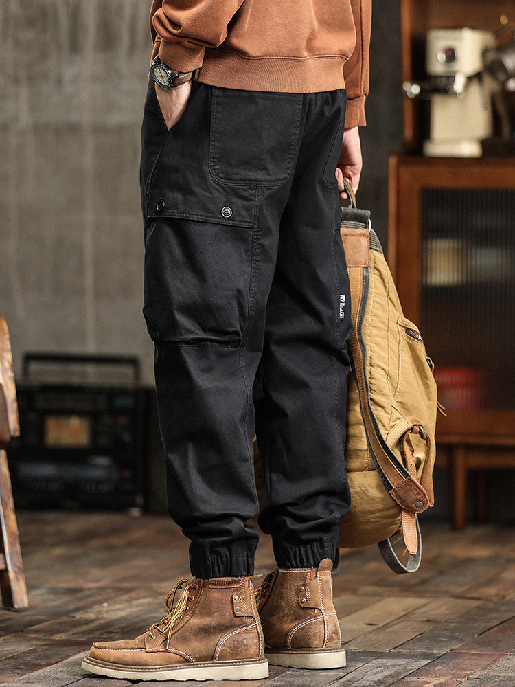 Herren-Cargohose mit elastischem Bund, Knopfleiste und schmal zulaufendem Bein