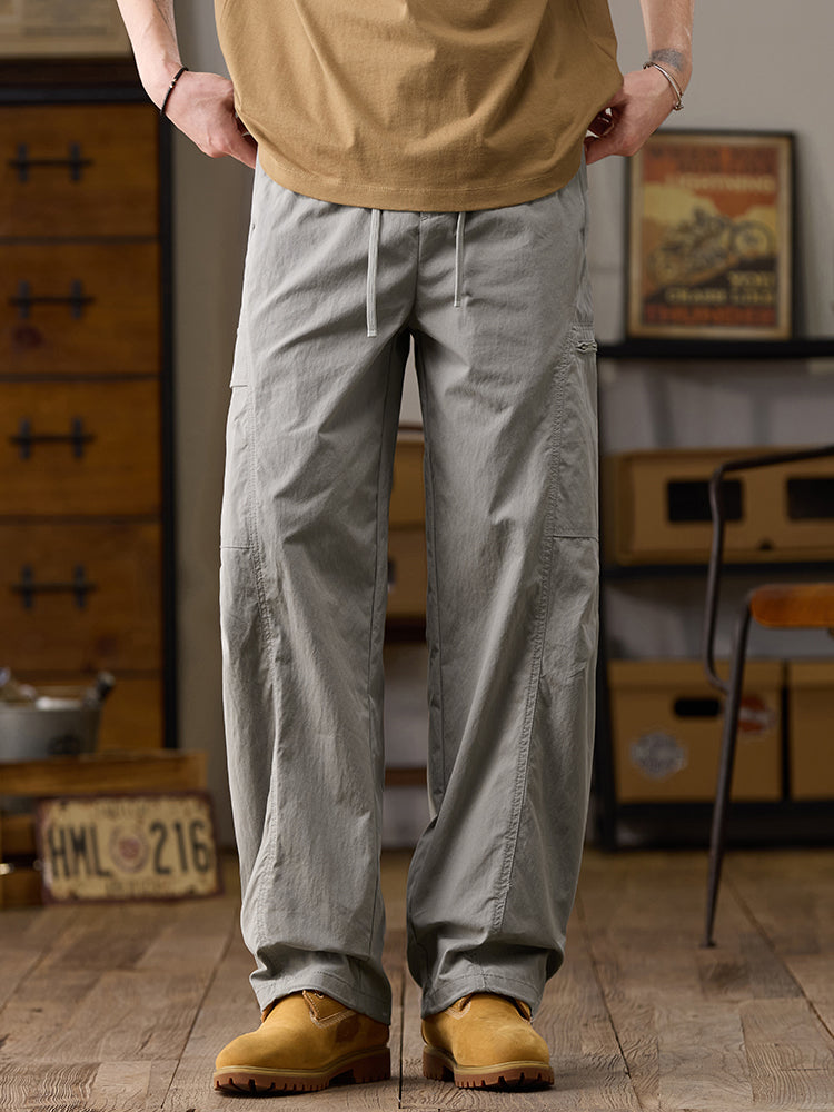 Pantalon cargo homme à jambes larges et poches multiples zippées