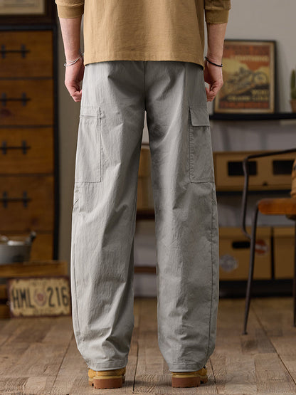 Pantalon cargo homme à jambes larges et poches multiples zippées