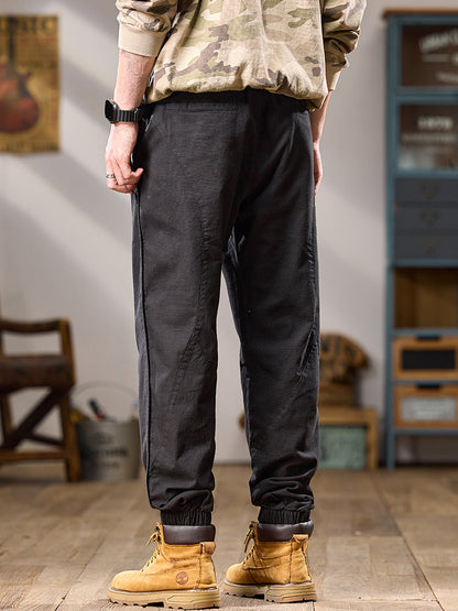 Lässige Herren-Jogginghose aus reiner Baumwolle mit mehreren Taschen und elastischen Bündchen