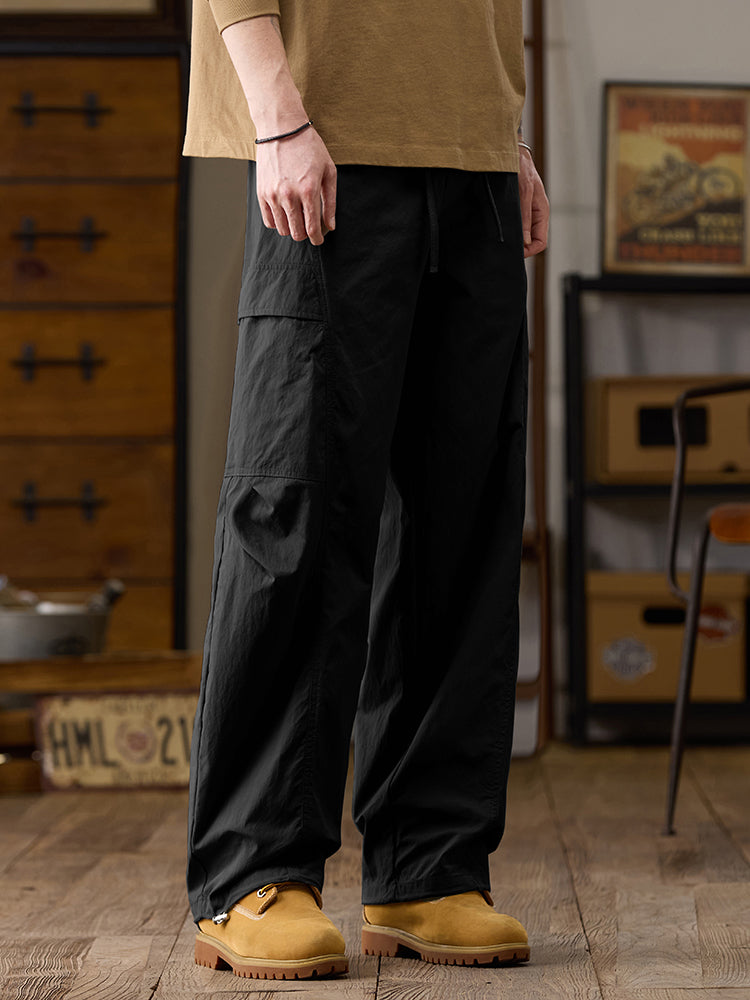 Pantalon cargo homme à jambes larges et poches multiples zippées