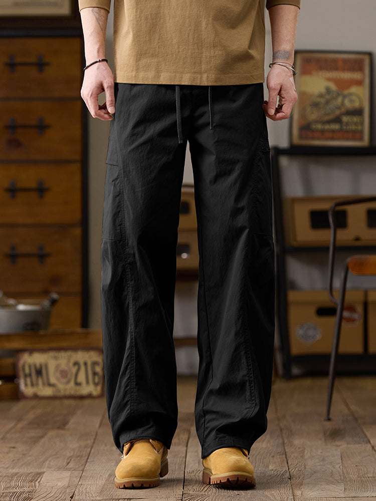 Pantalon cargo homme à jambes larges et poches multiples zippées
