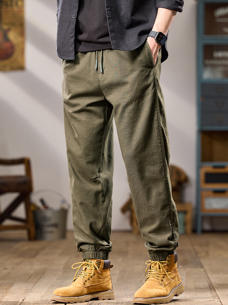 Pantalones casuales de algodón puro para hombre, corte relajado, múltiples bolsillos y puños elásticos
