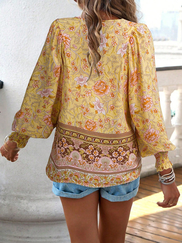 Blusa da donna con stampa floreale boho e nodo al collo